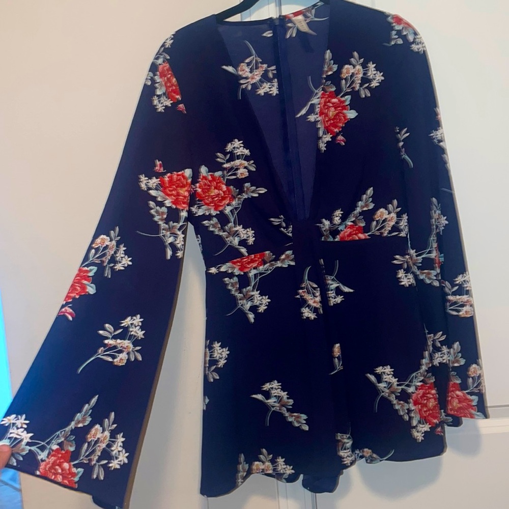 Womens floral romper; worn once; great condition
